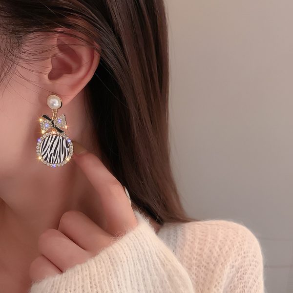 Diamond-Style Pearl Bow Earrings