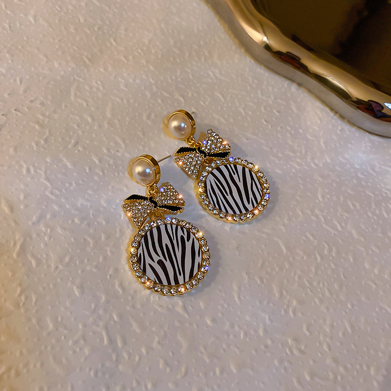 Diamond-Style Pearl Bow Earrings - Image 5